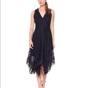 NWT Just Taylor Navy lace dress. Handkerchief hem